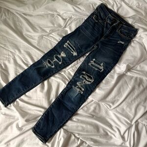 blue american eagle next stretch level patched no show ripped jeans short 00